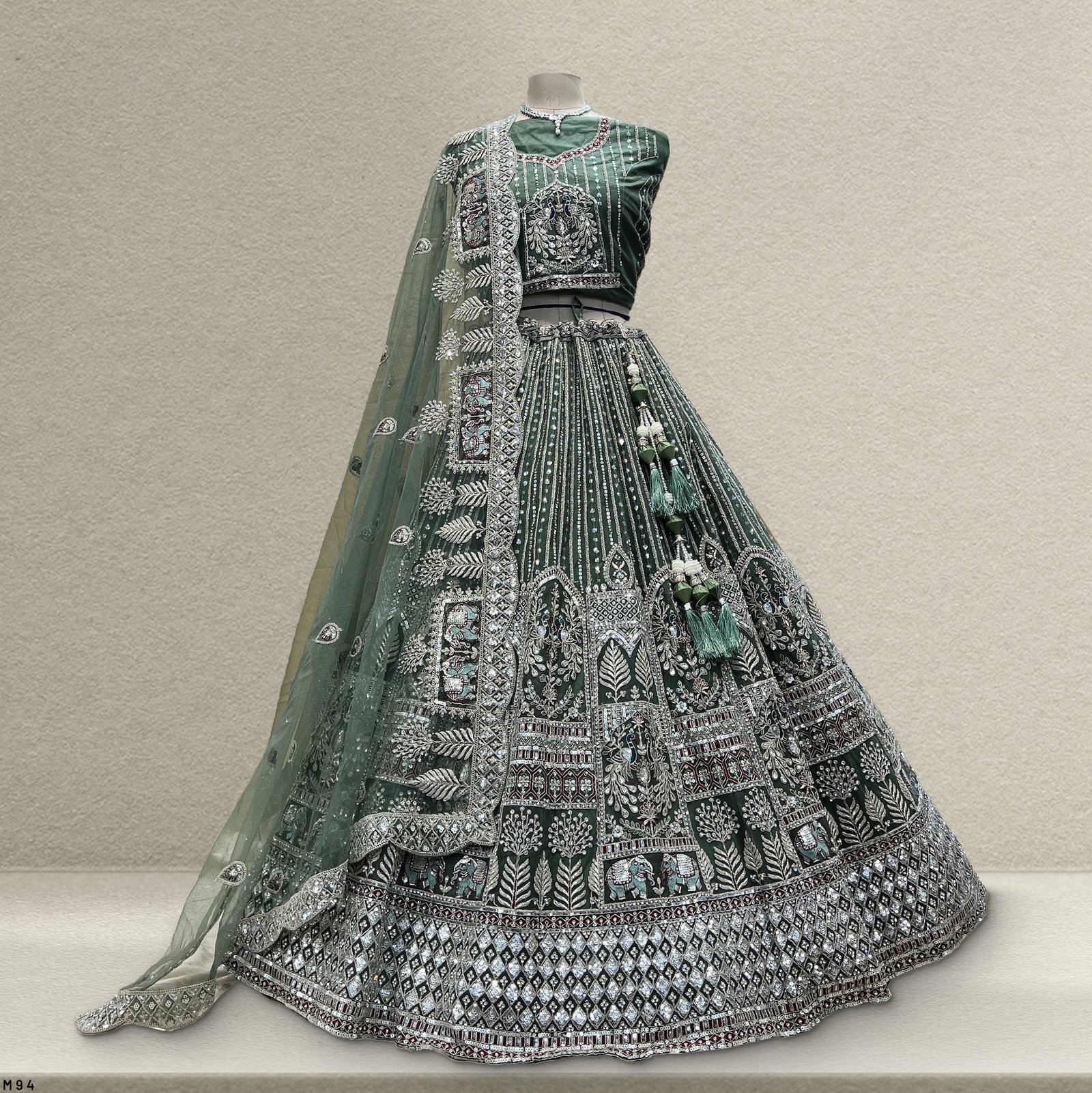 Cherry Blossom - The Elephant Peacock Partywear Designer Lehenga Sea Green Color