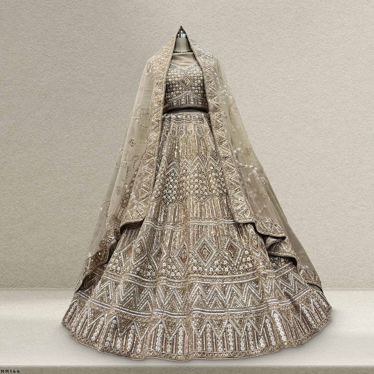 Cherry Blossom  -  The Modern Ivory Lehenga for Reception for Bride