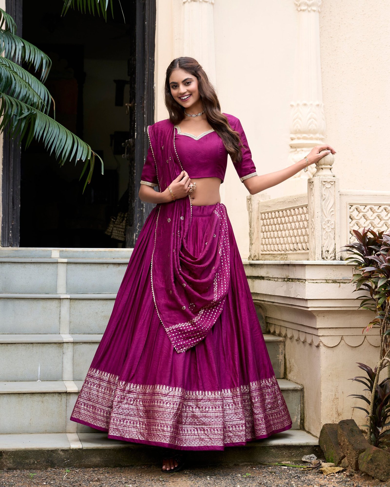 Doli - Plain With Weaving And Intricate Zari Work Border Wine Lehenga Choli